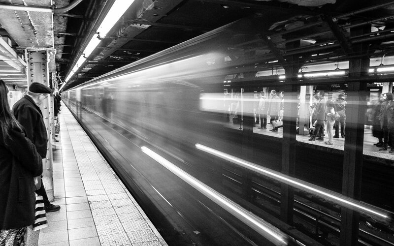 Subway Train in Motion — Black, Dynamic, Photograph, People