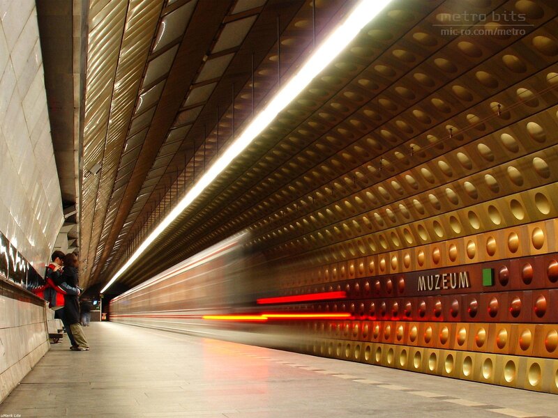 Subway train passing station