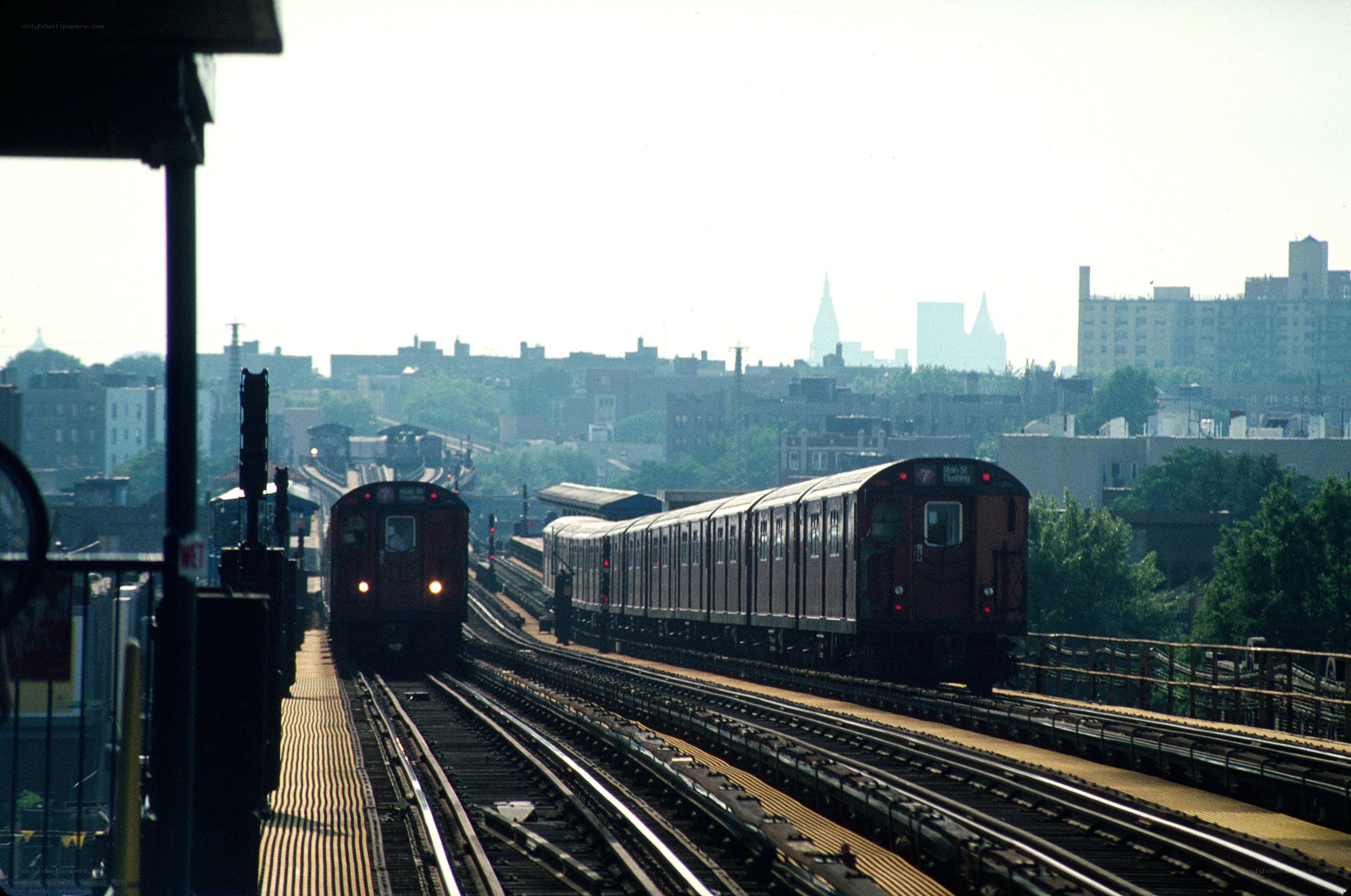 Subway trains on elevated tracks