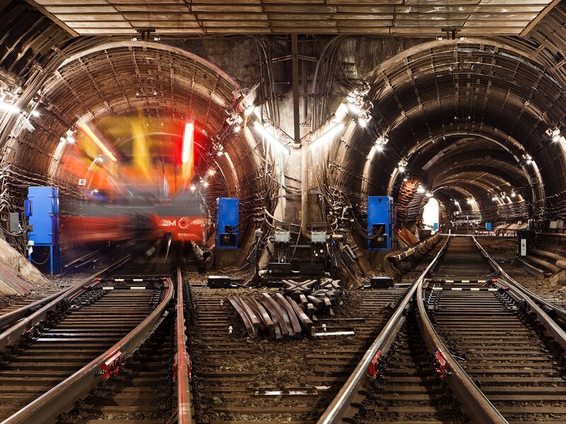Subway tunnel with moving train