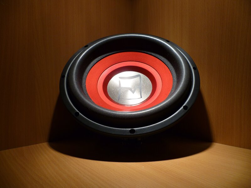 Subwoofer on Wooden Surface — Black