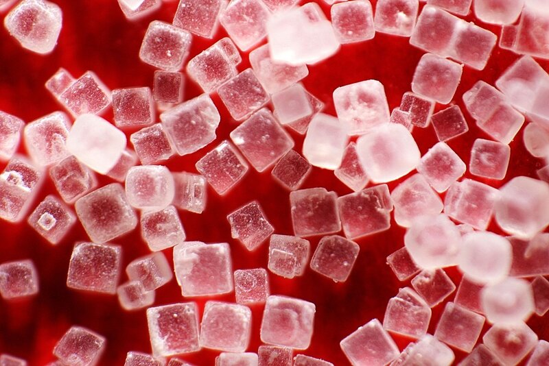 sugar crystals on red background