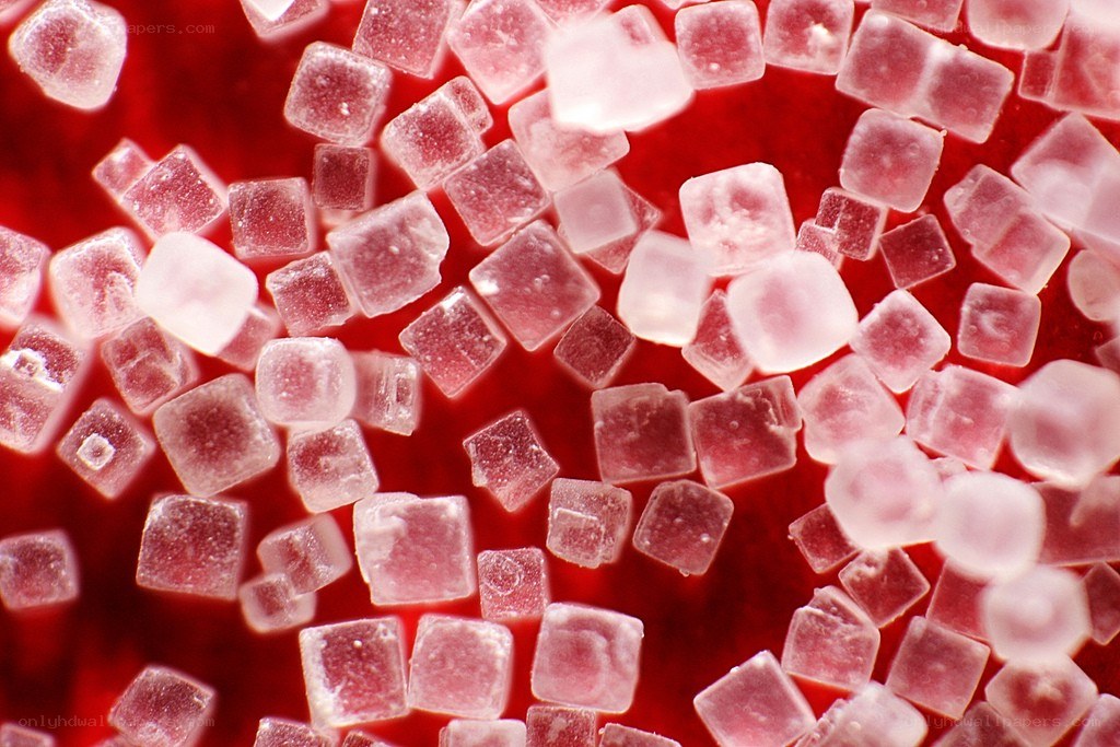 sugar crystals on red background