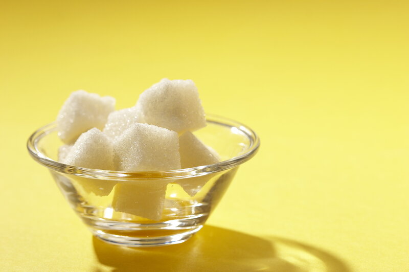 Sugar cubes in a glass bowl