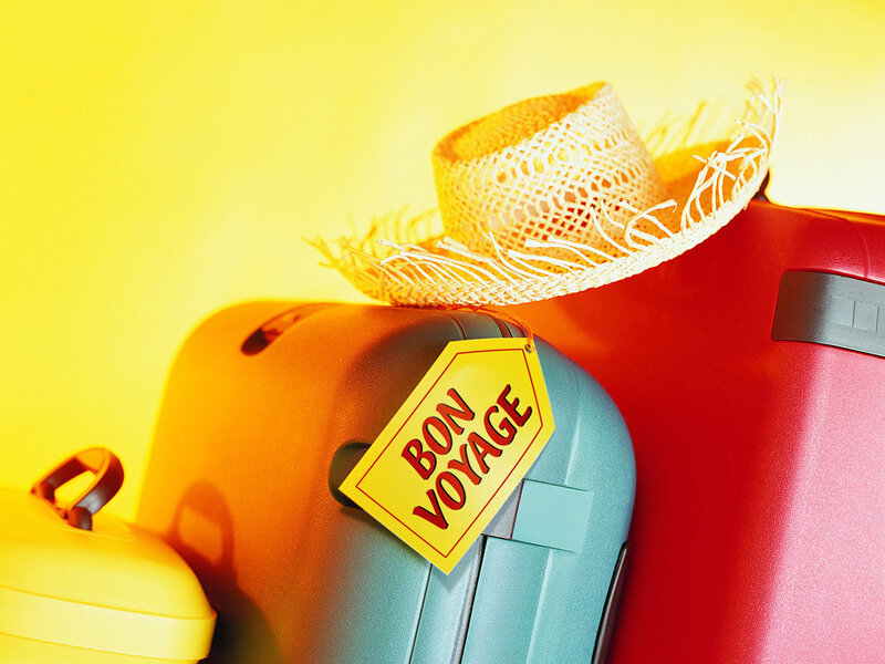 Suitcases with Straw Hat