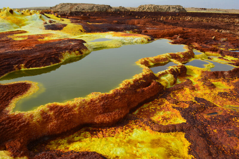 Sulfur Pools in Volcanic Terrain