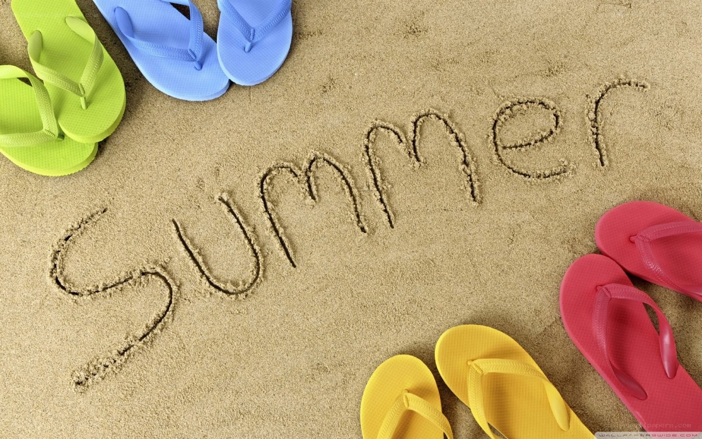Summer sand writing with flip flops