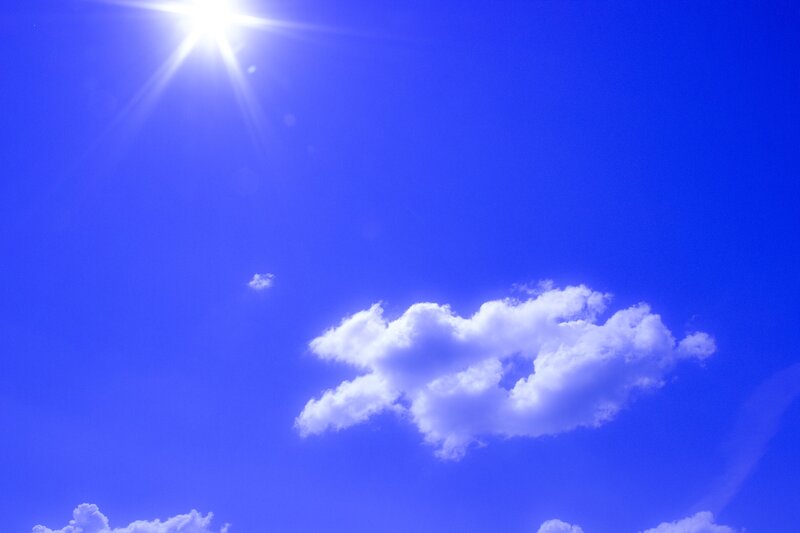 Sun and Clouds in Sky — Blue, Serene