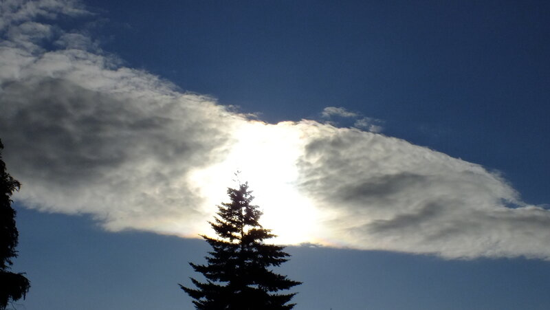 Sun Behind Cloud — Blue