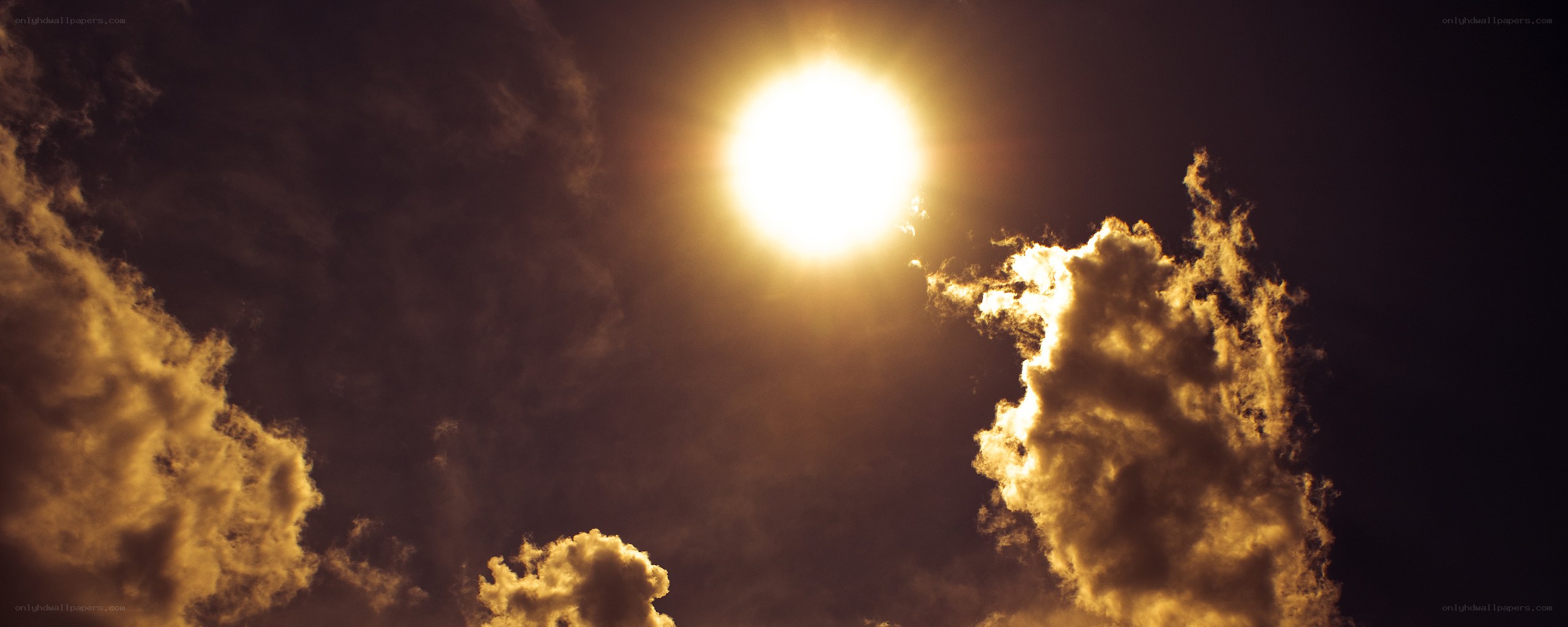 Sun behind clouds