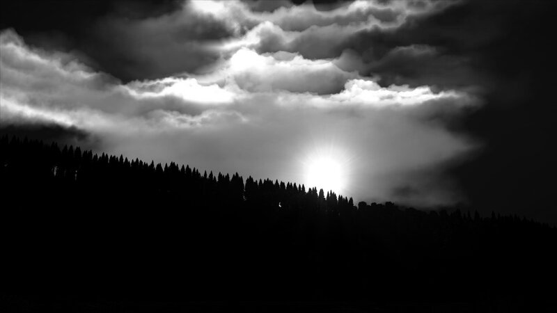 Sun Behind Clouds — Black