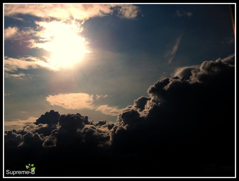 Sun Behind Clouds — Blue