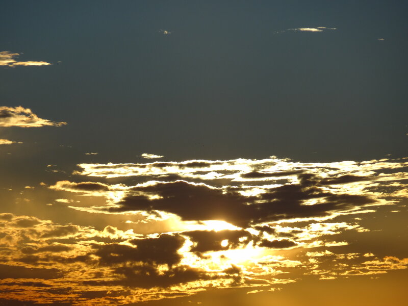 Sun Behind Clouds — Gold, Dramatic