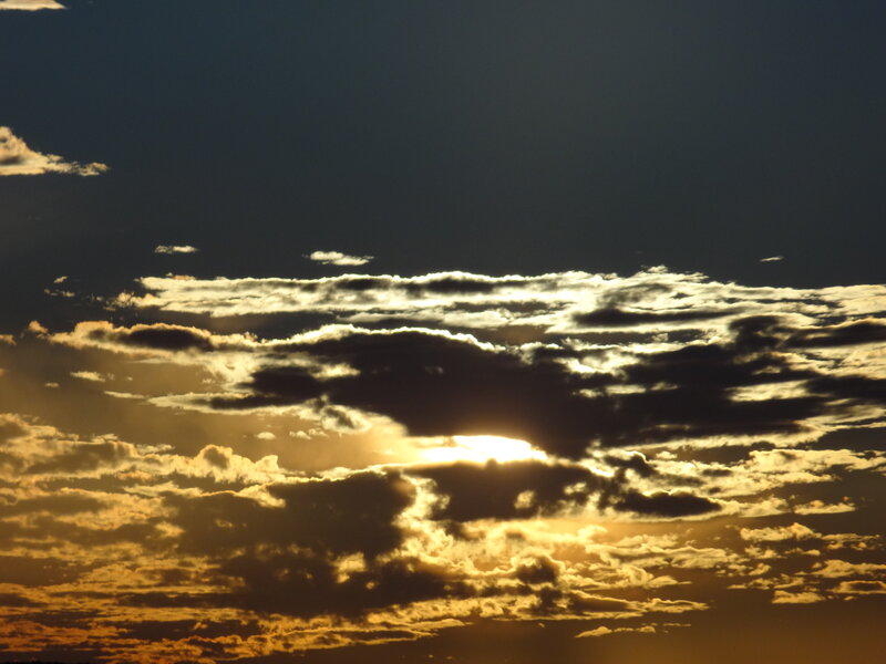 Sun Behind Clouds — Gold