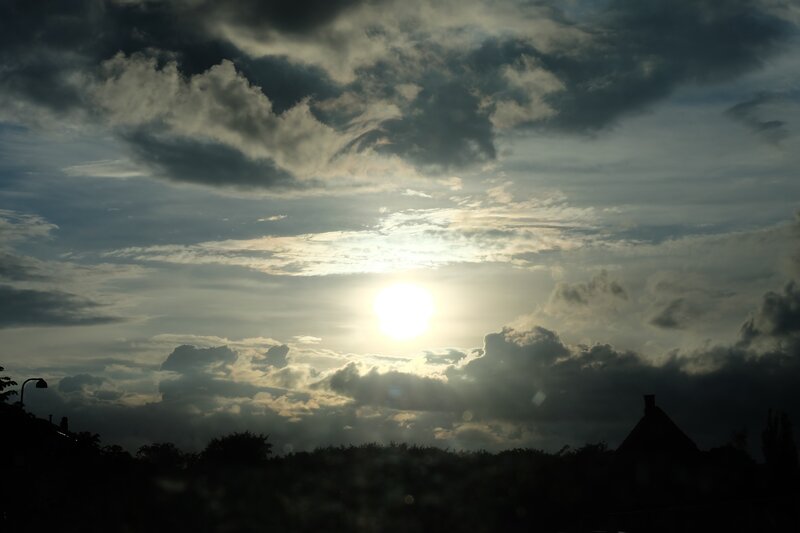 Sun Behind Clouds — Gray, Dramatic, Sunset, Photograph, Trees, Building