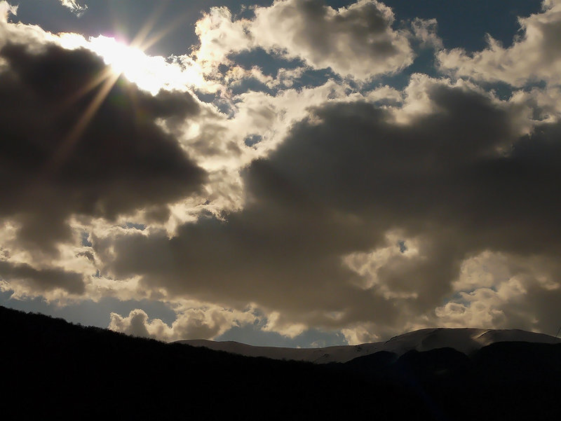 Sun Behind Clouds — Gray