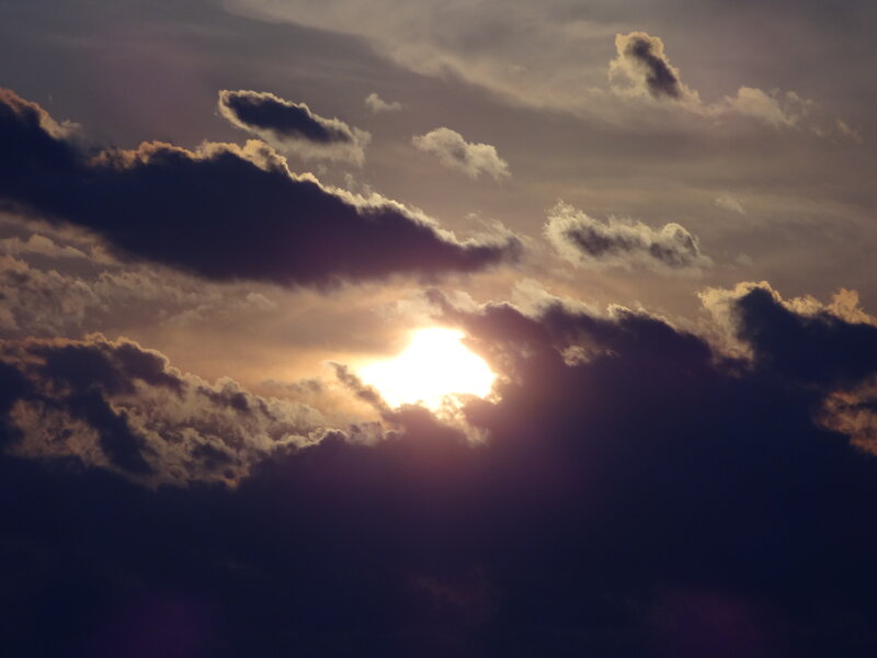 Sun Behind Clouds — Purple