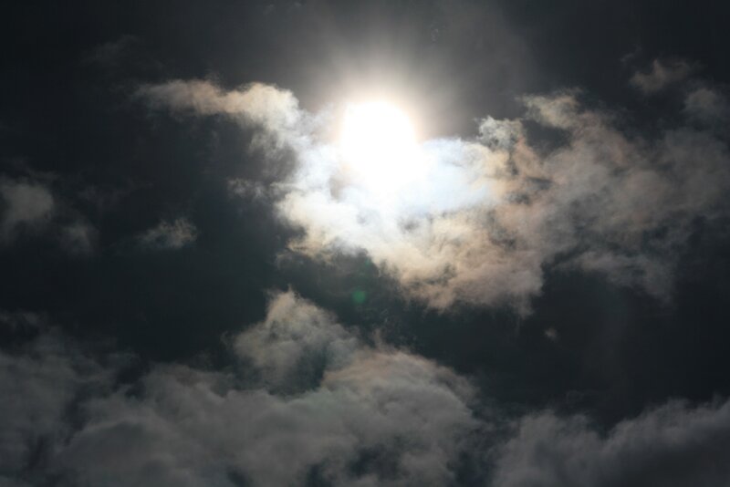 Sun Behind Clouds — White, Dramatic