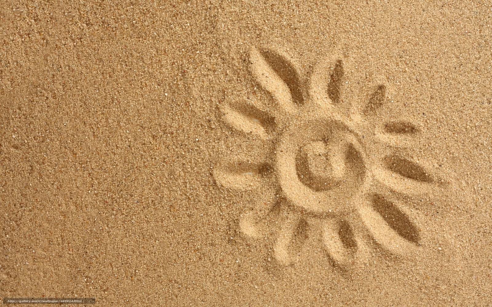 Sun drawn in the sand
