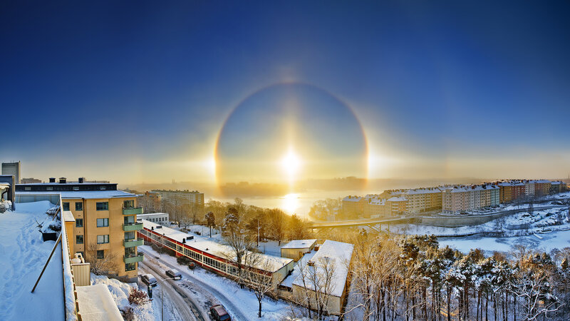 Sun Halo over Snowy City — Blue, Serene