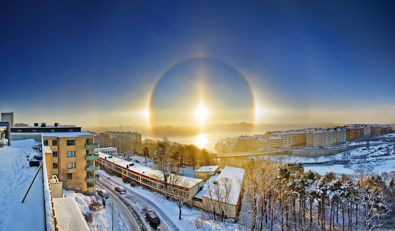 Sun Halo over Snowy City — Blue