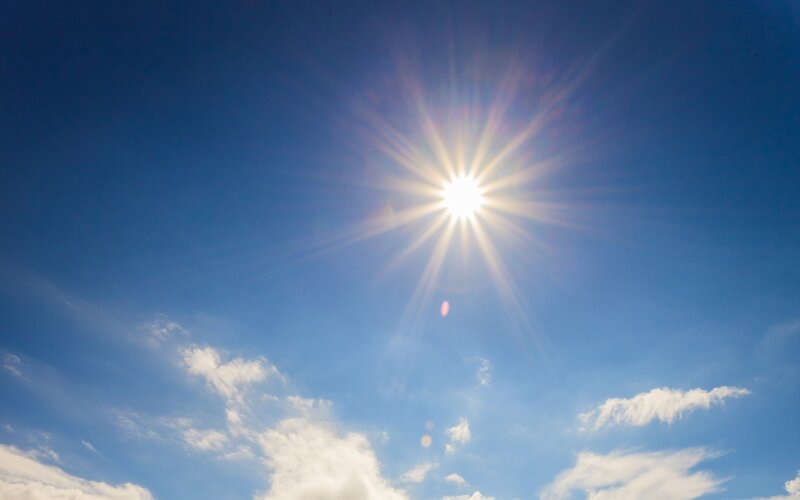 Sun in Blue Sky — Bright, White