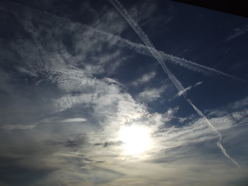 Sun in Cloudy Sky — Blue, Dramatic