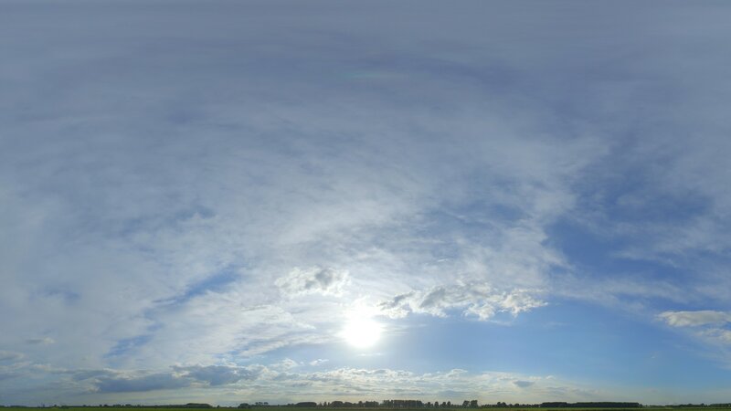 Sun in Cloudy Sky — Blue, Serene