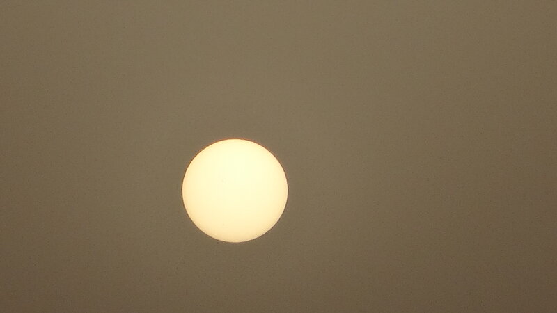 Sun in Hazy Sky — Gray