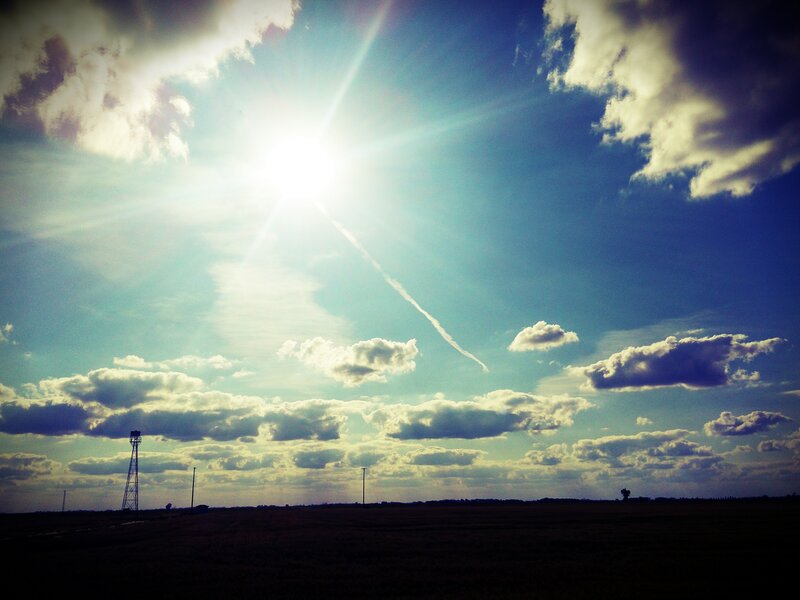 Sun over a rural landscape