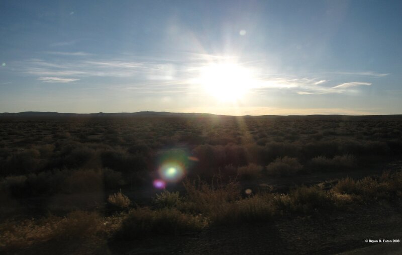 Sun over Desert Landscape