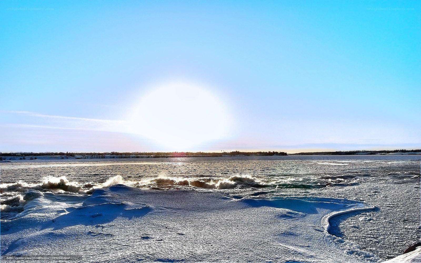 Sun over frozen river