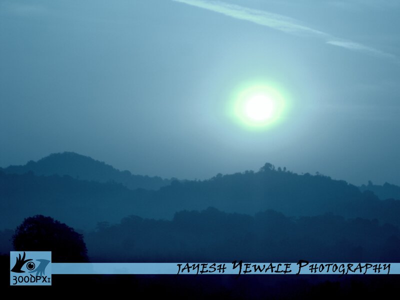 Sun over Hills — Blue