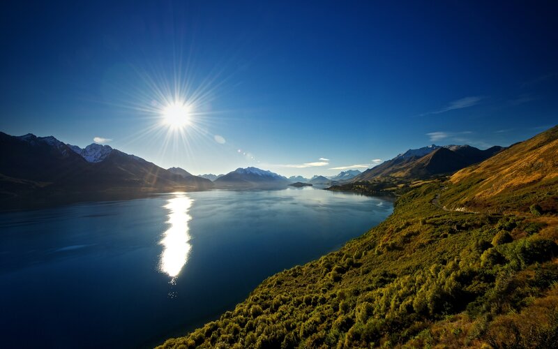Sun over Lake and Mountains — Blue, Serene, Morning