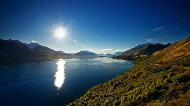 Sun over Lake and Mountains — Blue