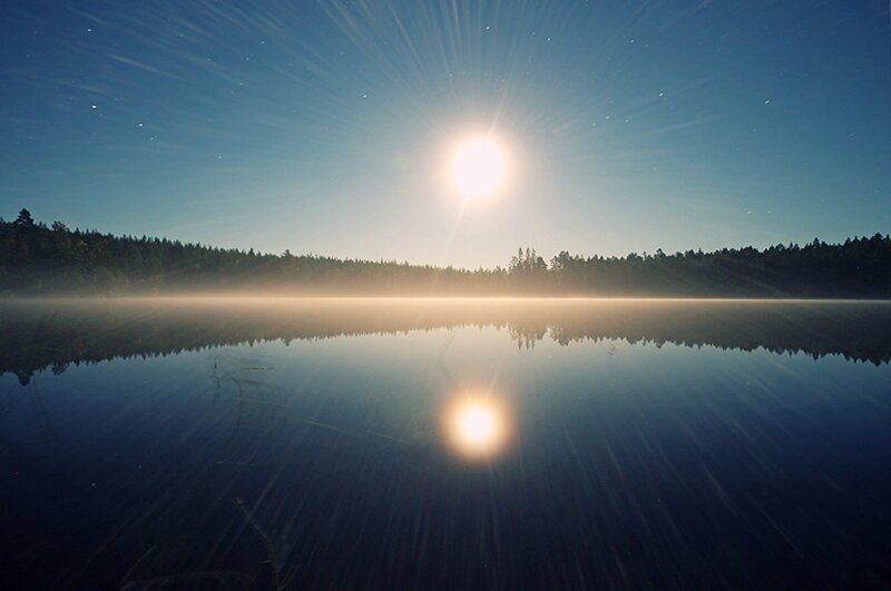 Sun over Misty Lake