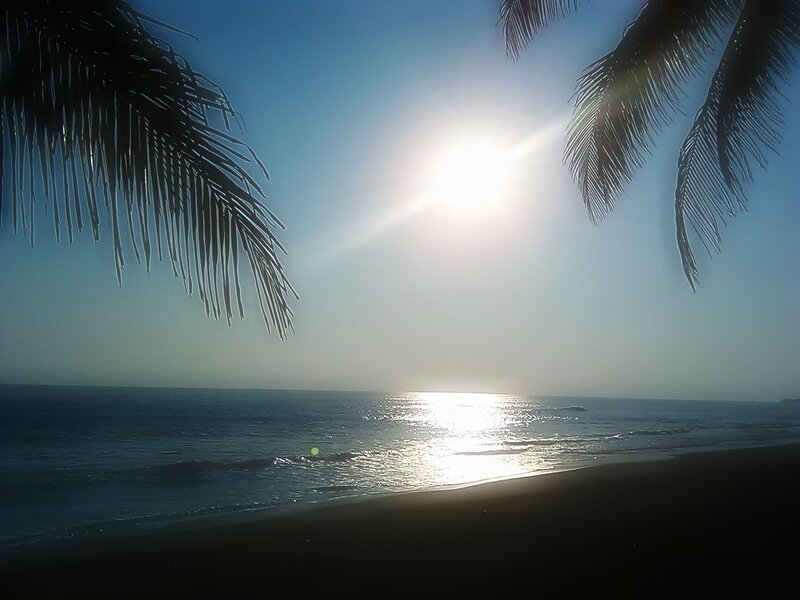 Sun over Ocean at Beach