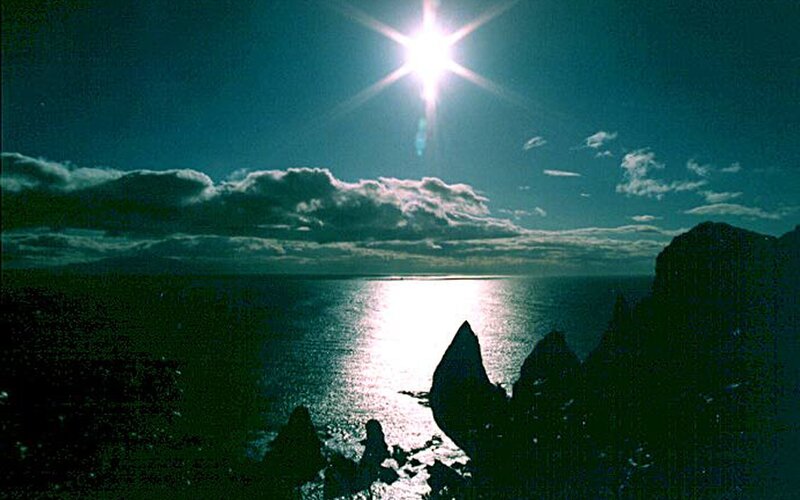 Sun over Ocean at Night