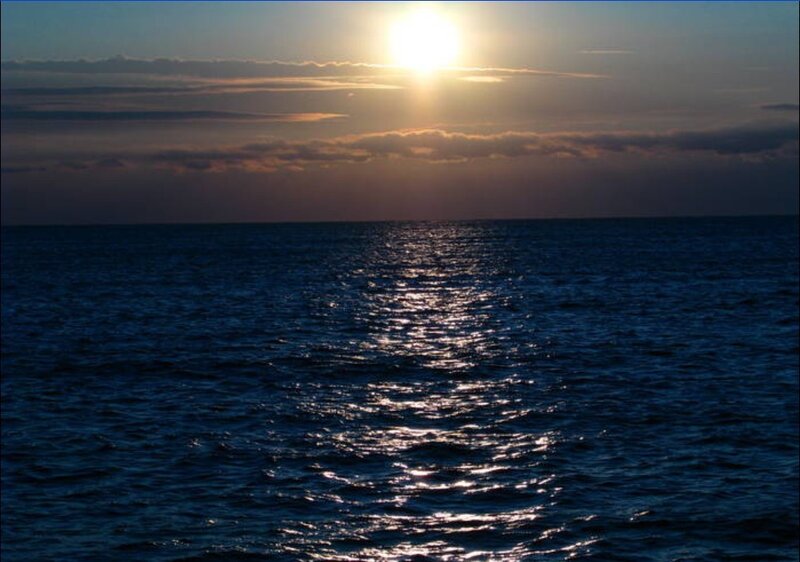 Sun over Ocean — Blue, Serene, Sunset, Photograph, Sky, Clouds