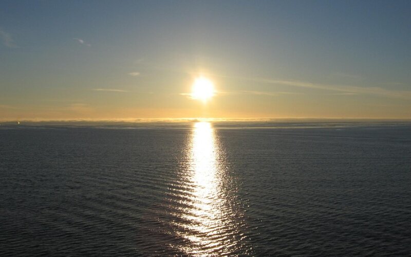 Sun over Ocean — Blue, Serene, Sunset, Photograph, Sky, Yellow