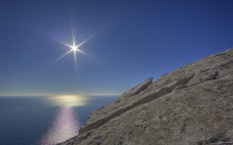 Sun over Ocean Cliff