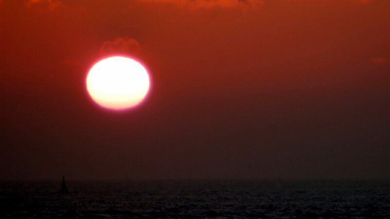 Sun over Ocean — Red, Dramatic