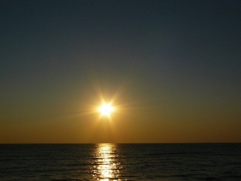 Sun over Ocean — Yellow, Serene, Sunset, Photograph, Sky, Blue
