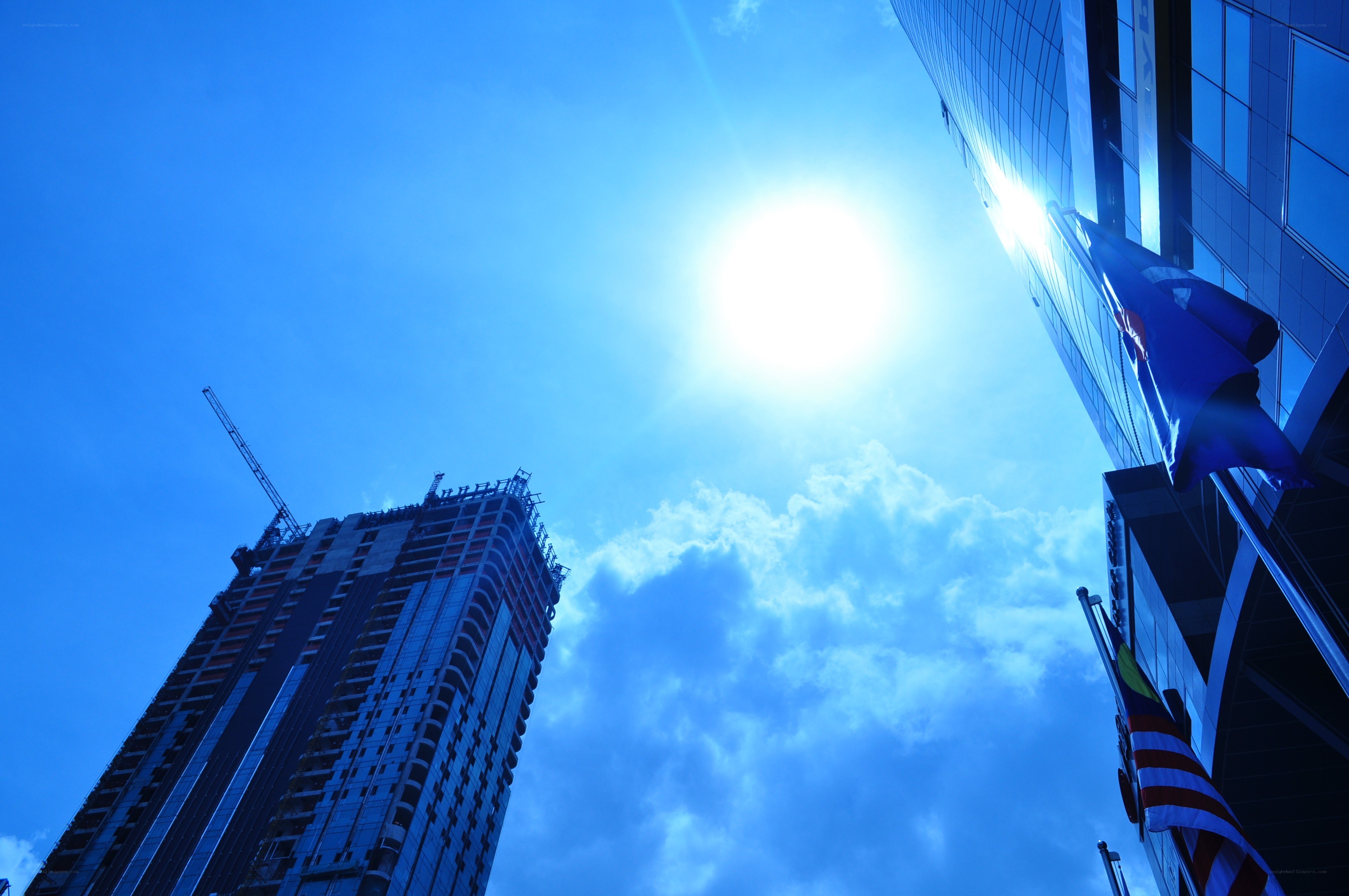 Sun over skyscrapers