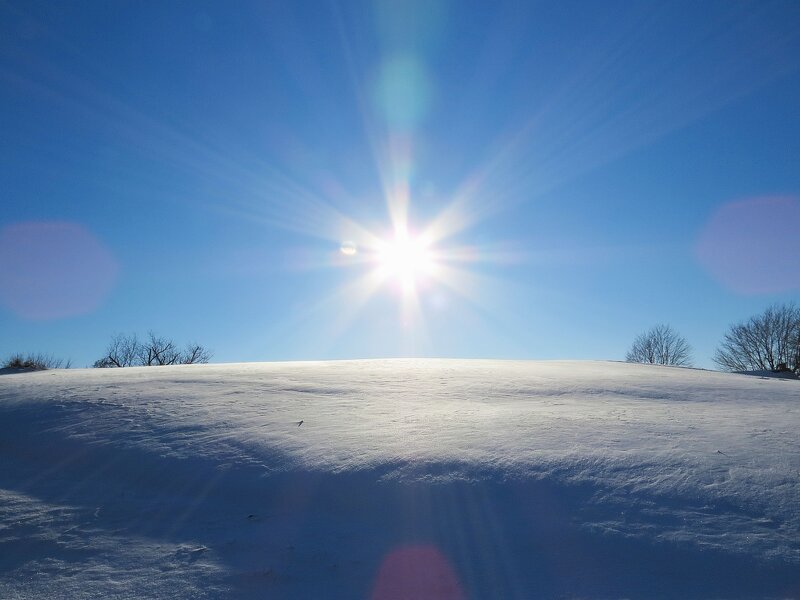 Sun over Snowy Hill — Blue