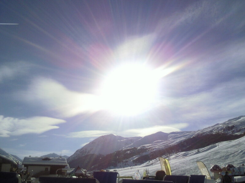 Sun over Snowy Mountains
