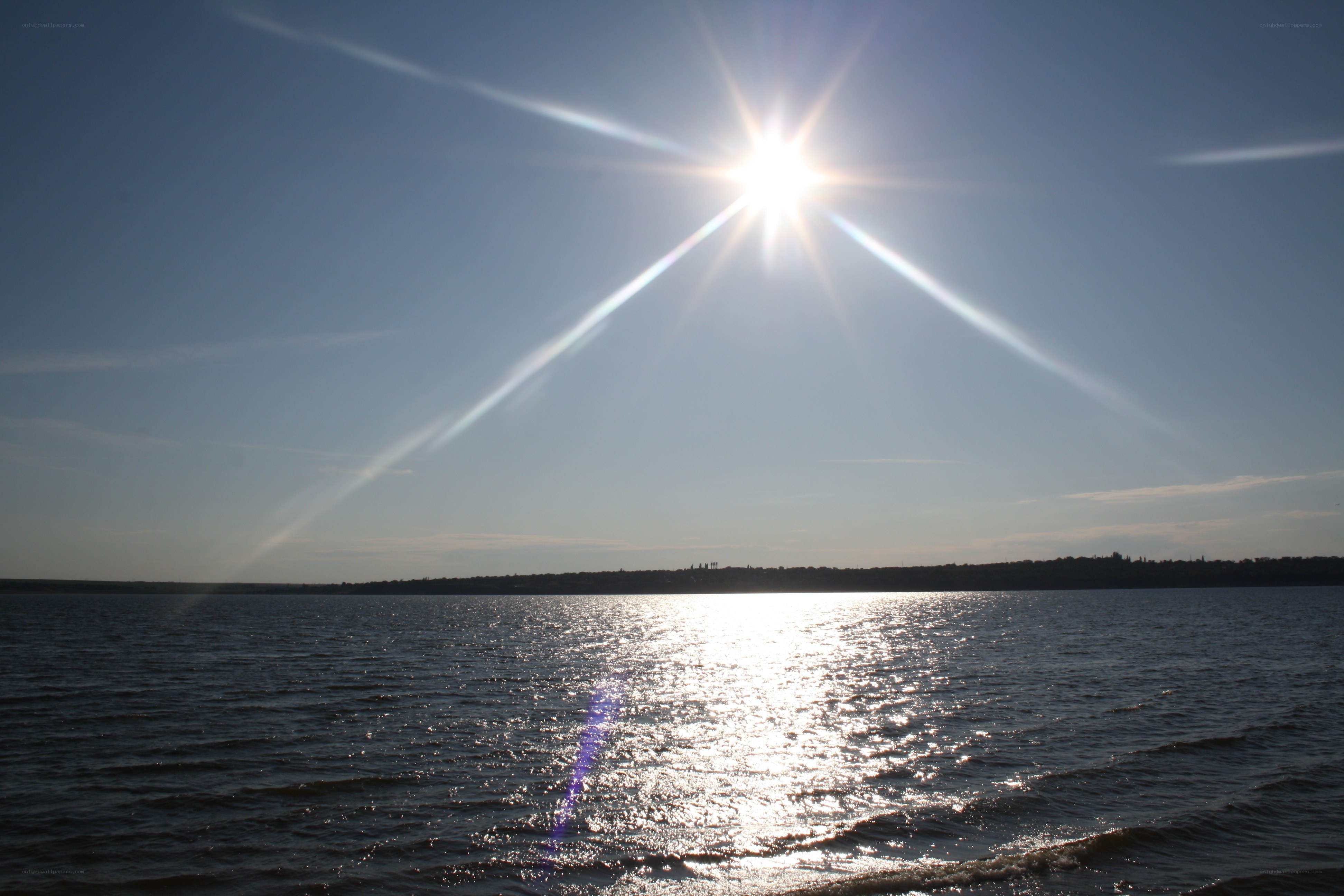 Sun over the water