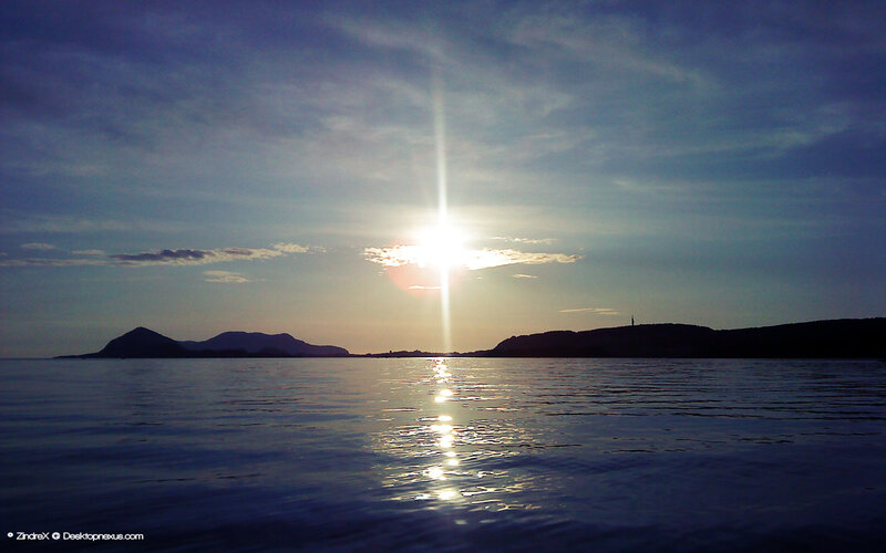 Sun over Water and Hills