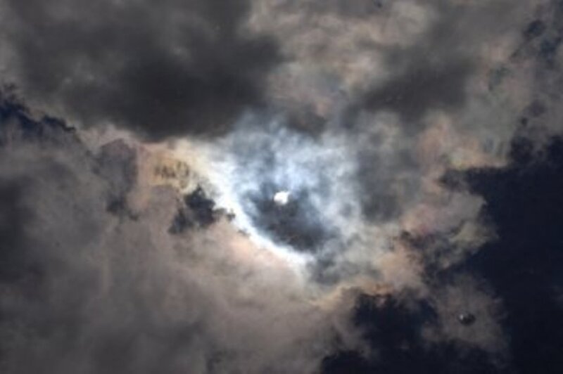 Sun Partially Obscured by Clouds — Gray