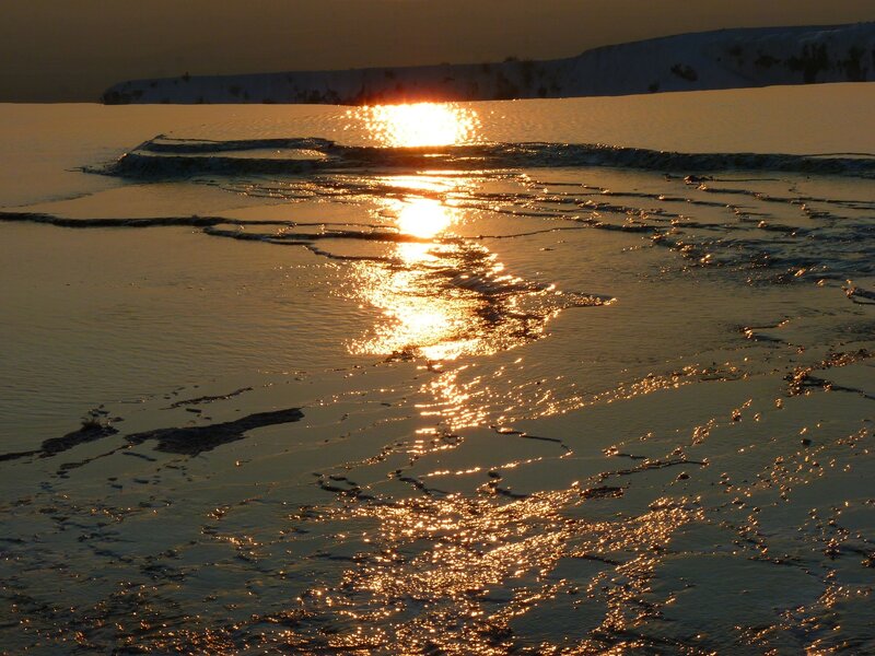 Sun Reflecting on Icy Water